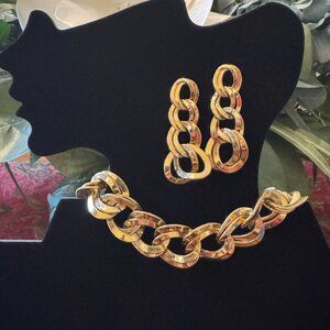 Set of Gold Interlocking Bracelet and Dangling Earrings